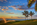  Vista al amanecer de un green en un campo de golf de la isla de Gran Canaria como el Lopesan Meloneras con vistas al mar Atlántico 